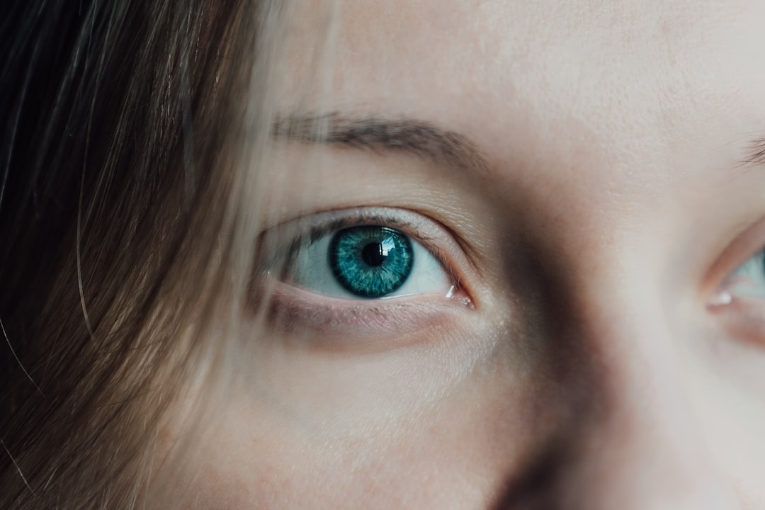 Closeup of a woman's eyes — representing the vision Sinclair Technologies works to protect